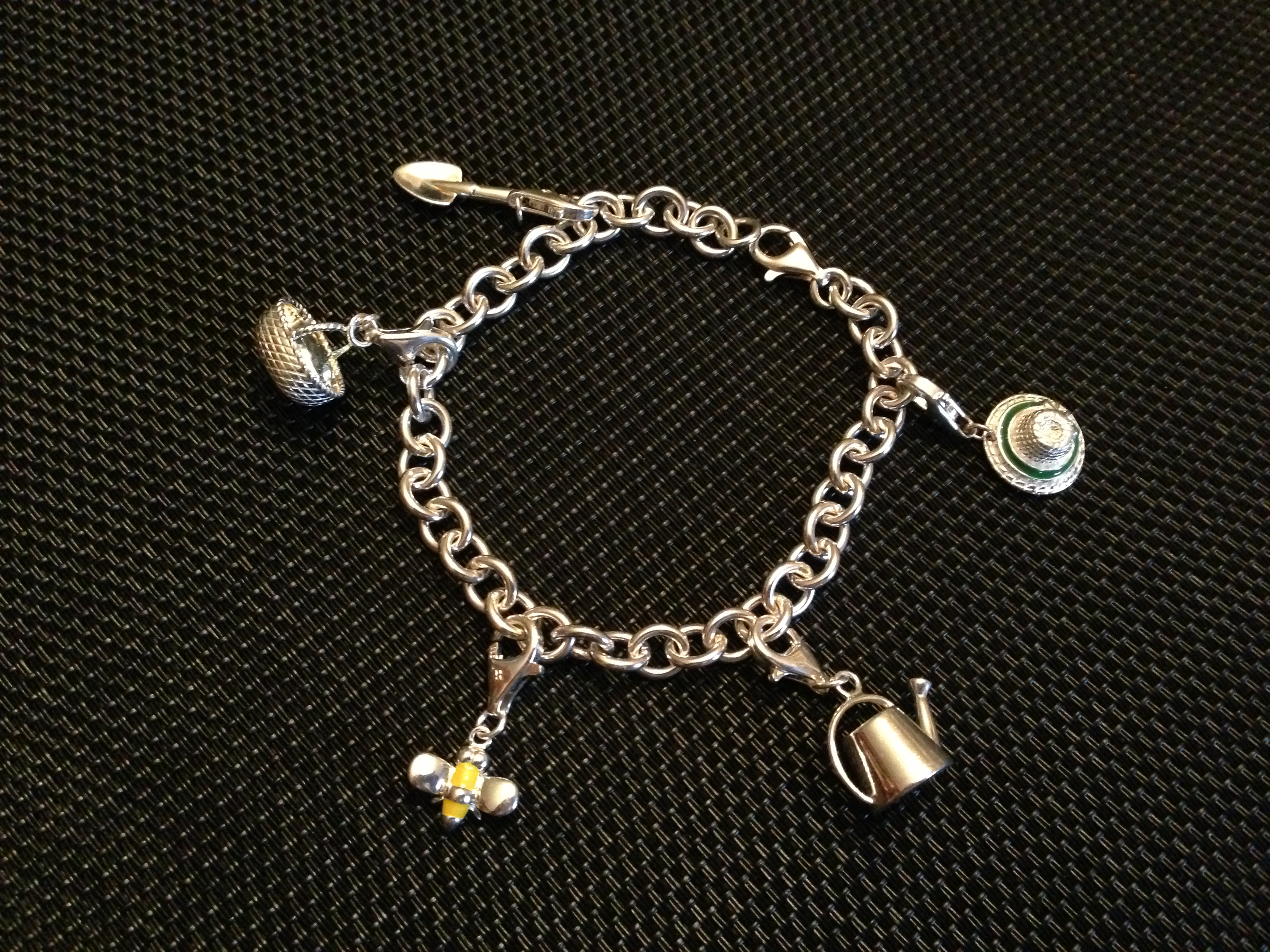 Sterling silver gardening-themed bracelet that a friend gave me.